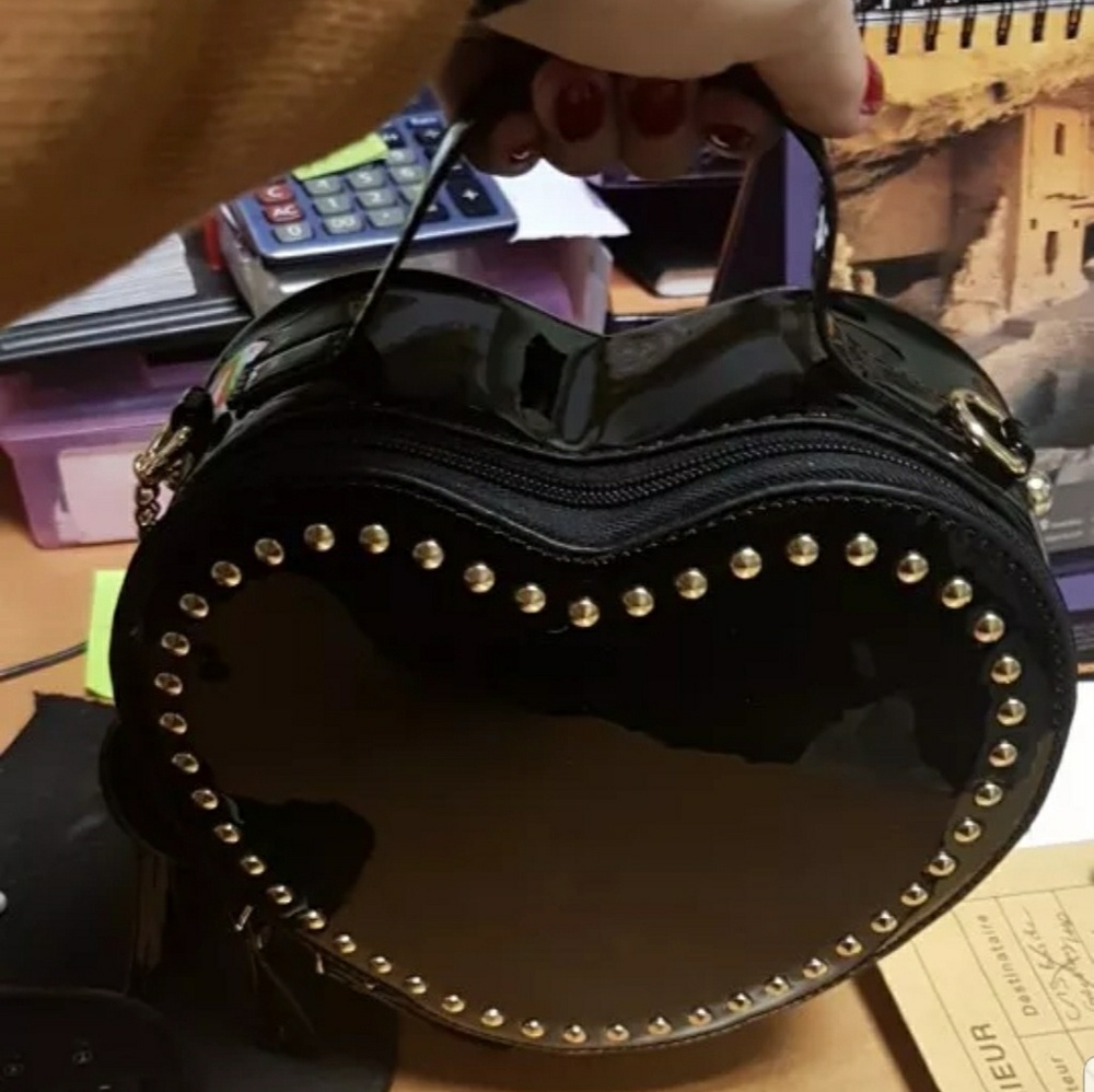 Small heart shaped studded handbag